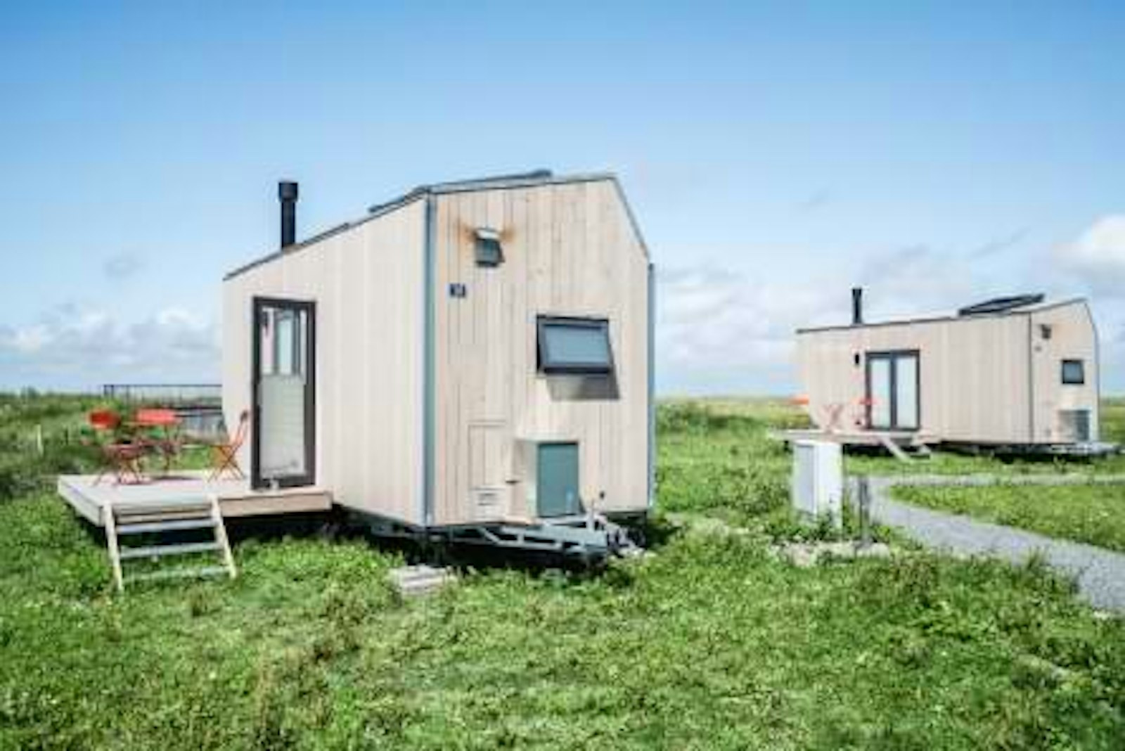 tinyhouses.jpg Wohnkonzepte der Zukunft: Das Bild zeigt ein TinyHouse stehend auf einer Wiese.